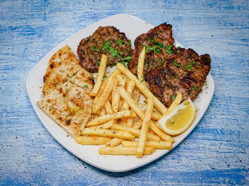 Pork Fillets with french fries and pitta bread